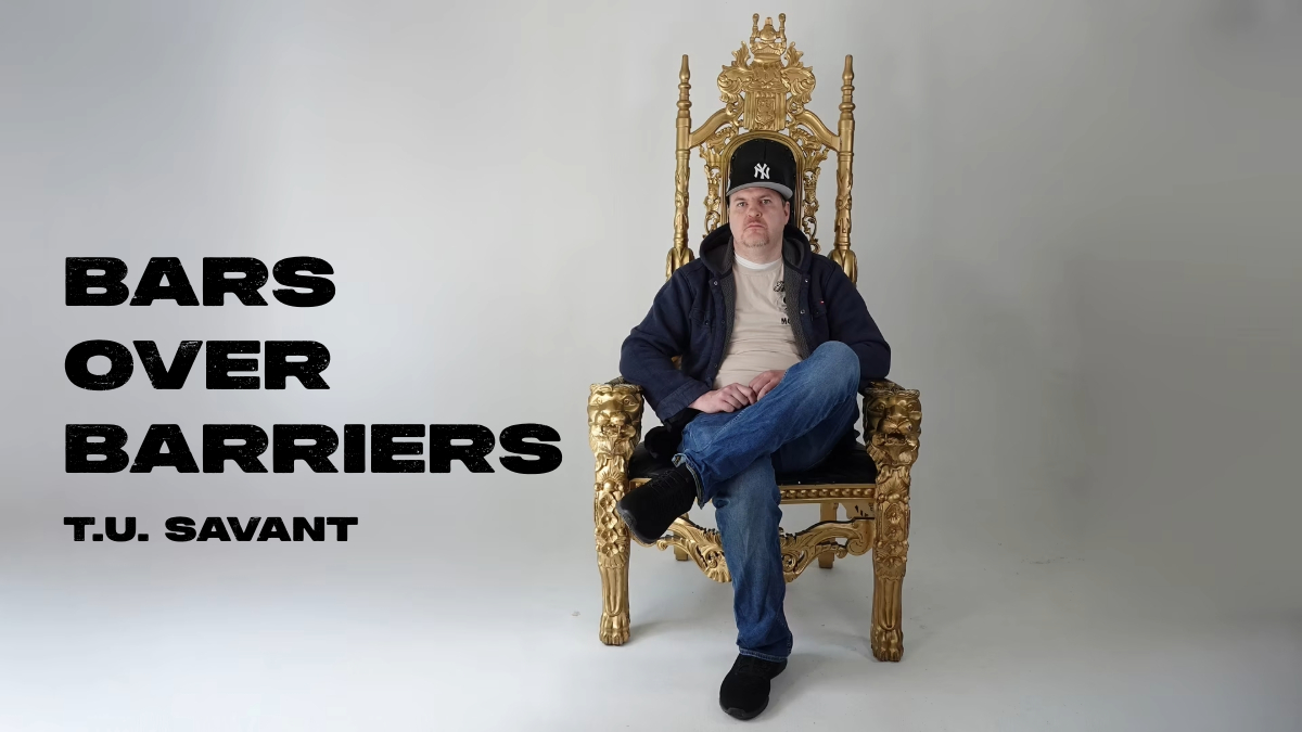 Special Needs rapper T.U. Savant sitting on throne